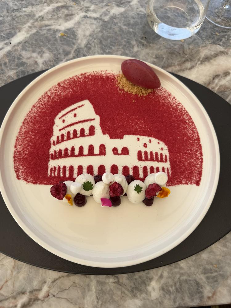 A dessert plated with the Colosseum