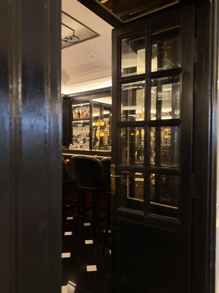 A black lacquered bar door